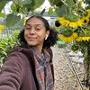 selfie of India Nunn in a garden with sunflowers selfie of India Nunn in a garden with sunflowers