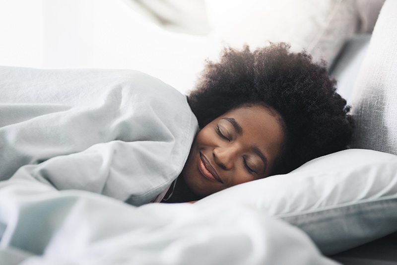 happy woman sleeping